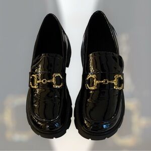 Lonza Women’s Glance Buckle Elegant Black Loafers with Gold Accent Buckles